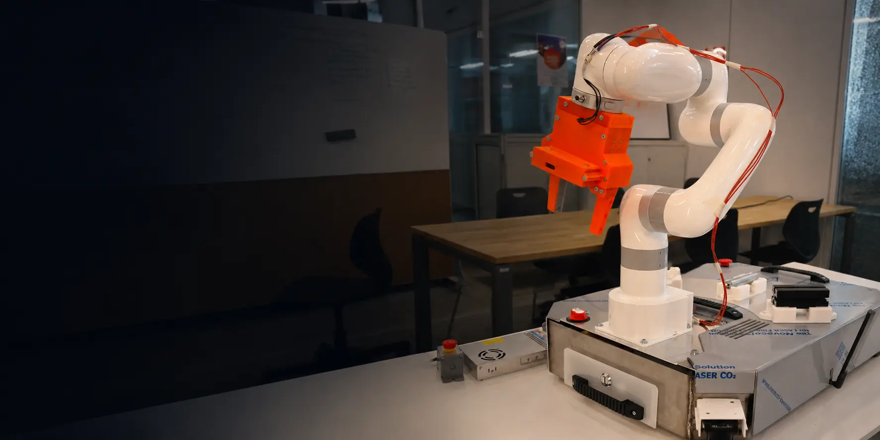 UFACTORY Lite 6 cobot with a 3D-printed gripper mounted on a compact base for mobile manipulation research