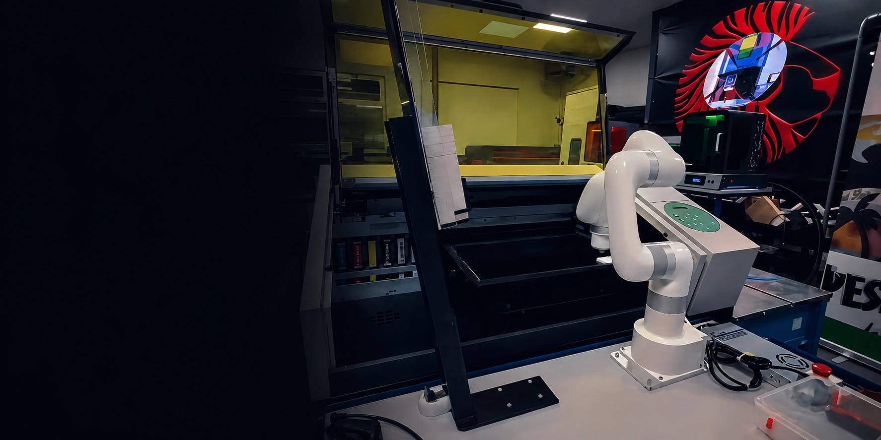 Lite 6 cobot reaches into a machine enclosure during an automated machine tending cycle